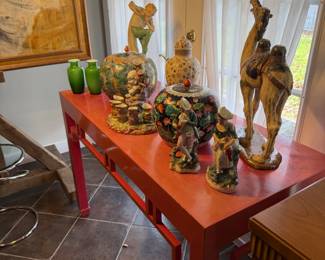 Collectible items include ginger jars and Lladró retired camel