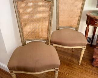 Pair of distressed French provincial chairs