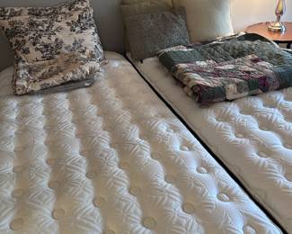 King bed, pillows, vintage quilt