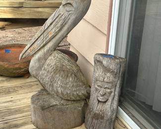 Drift wood pelican and Native face 