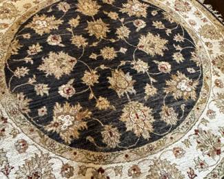 Vintage Black and Beige Round Oriental Hand Knotted Rug