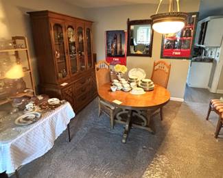 Dining room is full of china, glassware, silverplate and frames.  