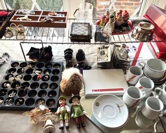 The "goodie table" is full of fun, interesting things.  Costume jewelry, wallets, dolls and misc.