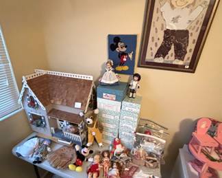 The dollhouse pictured has just been claimed by a family member.  Not for sale.  Lots of vintage dolls.  Madame Alexander dolls in boxes.