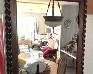 Beautifully carved oak mirror.