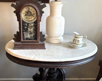Antique oval marble top parlor table.                                                             $100.00 BUY IT NOW! Call Jan at 314-960-5700 to purchase. 