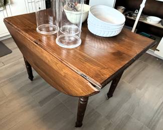 Antique drop leaf table with leaves.  Great legs!                                        BUY IT NOW! $195.00  Call Jan at 314-960-5700 to purchase.  42L x 26W x 29 1/2 H
