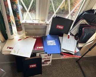 Lots of TWA items, first aid kit, bags, folders, menus and many misc. items.