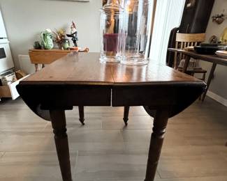 Antique drop leaf table with leaves.  Great legs!                                        BUY IT NOW! $195.00  Call Jan at 314-960-5700 to purchase.  42L x 26W x 29 1/2 H