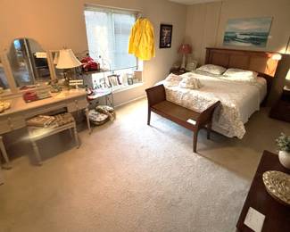 This master bedroom is also full.  Queen size bedroom furniture, painted antique vanity, home decor, frames and more.