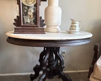 Antique oval marble top parlor table.                                                             $100.00 BUY IT NOW! Call Jan at 314-960-5700 to purchase. 