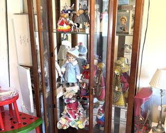 Very nice size curio/display cabinet.  Mirror back with three glass shelves.                                                                                                 $150.00 BUY IT NOW! Call Jan at 314-960-5700 to purchase.  