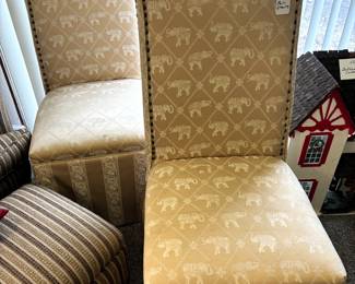 We have two pairs (four chairs) of these elephant print chairs that are beautifully bradded.  