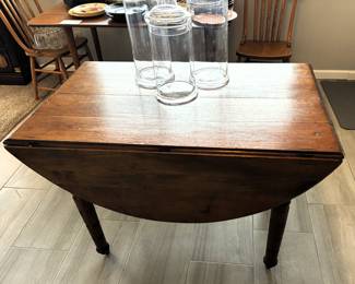 Antique drop leaf table with leaves.  Great legs!                                        BUY IT NOW! $195.00  Call Jan at 314-960-5700 to purchase.  42L x 26W x 29 1/2 H