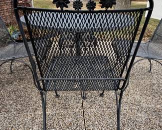 Woodard (?) iron patio table with four chairs.                                               BUY IT NOW $125.00  Call Jan at 314-960-5700  to purchase.  21 1/2 diameter.  