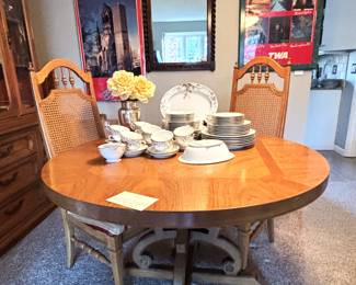 The vase holding the yellow flowers is from Restoration Hardware.  The china is not for sale.