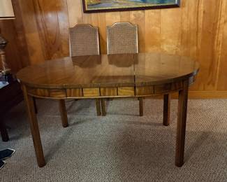 Mid century dining table, 2 leaves, & 6 upholstered cane back chairs (one with arms)