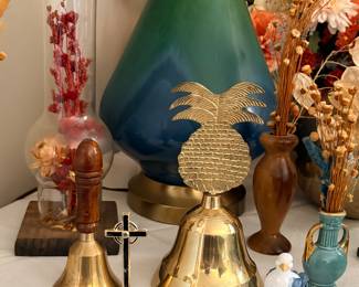 Vintage brass bells, decor, & dried flower arrangements