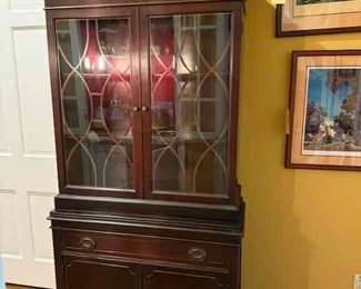 Antique Mahogany library/china cabinet with fretwork on glass doors and pediment