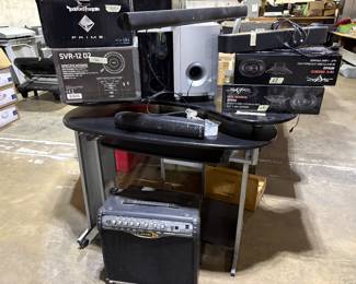 Skat speakers. Guitar amp, computer desk, volume bars