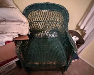 Green wicker armchair