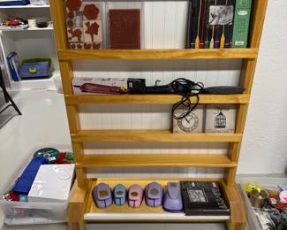 Custom made storage unit on wheels for supplies.