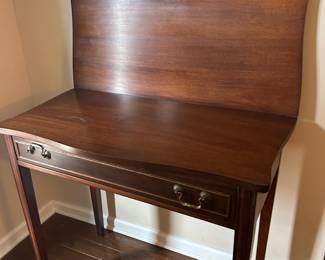 Card table open 
Does turn  to seat 4 people