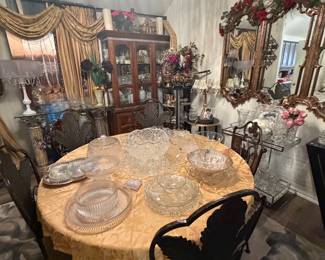Round glass top table w iron chairs