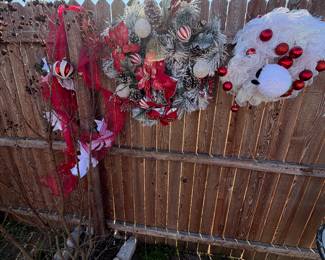Yard full of wreaths and trees 