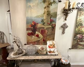Console table and one of many hanging painting scrolls