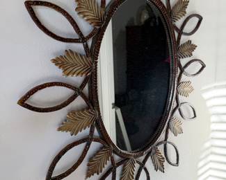 Large iron mirror