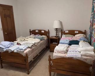 2 twin beds, night stand, sheet sets, towels, 