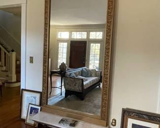 gold leaf pier mirror on marble top base