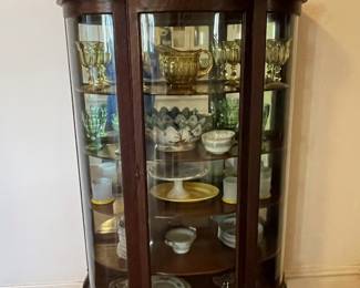 Round front china cabinet 