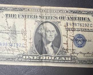  "Short Snorter," a dollar bill signed by fellow pilots and military personnel, used as a good luck charm and a way to enforce buying drinks (a "snort") for the group if you couldn't produce your signed bill when challenged. This tradition started with Alaskan bush pilots and became popular in military aviation, with bills often collecting many signatures from different locations. 