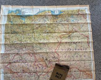 Original from the WWII US time period in good condition. No overseas shipping. Original WWII Silk Survival Map, Escape Evasion Map sets with the original carry pouch with the original saw blade & one compass  in the original unopened wrapping. The silk maps are double sided, 1943 sheets C/D & E/F for areas France Belgium Germany Switzerland Poland Slovakia Hungary Italy Croatia. The largest silk map (E/F) opened, measures approx. 34 1/4" x 30"