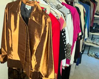 ANOTHER LONG RACK OF FINE CLOTHES