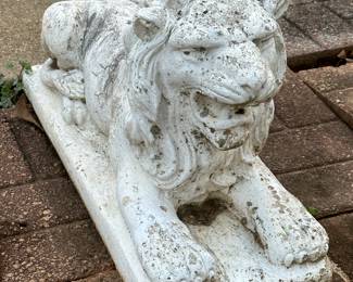 Pair of concrete lion statues