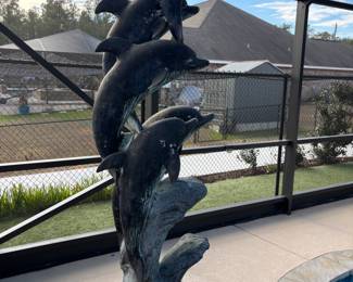 Five Dolphins Fountain bronze
$1,600. 25”w 40”d 94”t water sprays out of all 5 dolphins mouths!