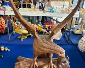 Wooden Eagle statue $250.00. 
 18”w 9” d  26”t