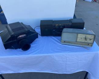 Super Prism Projector, Clock Radio And Cassette Recorder Player