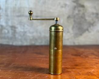 This lot features a stunning, large brass grinder manufactured by Zassenhaus in Germany.

