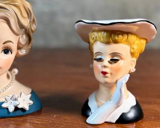 This lot features a pair of vintage lady head vases by Inarco & Nippon, circa 1950s. The largest measures, 5.5” H. 

