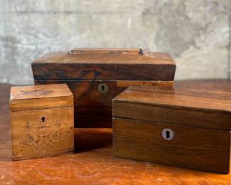 This lot features three (3) tea caddies from the 19th century.

