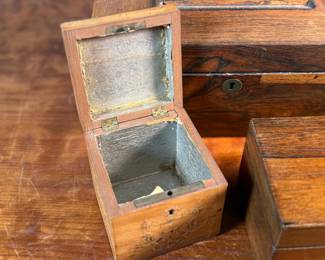 This lot features three (3) tea caddies from the 19th century.

