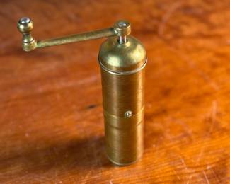This lot features a stunning, large brass grinder manufactured by Zassenhaus in Germany.

