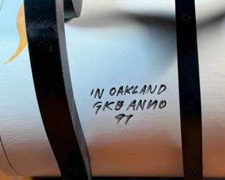 This lot features an original work of art by listed artist, Garry Knox Bennett. This piece is a uniquely designed humidor, signed by Bennett underneath circa 1997. This piece measures, 10” H x 11” W x 9” D. Born in Alameda, California, Garry Knox Bennett is a self-taught studio furniture maker who uses traditional fine woodworking techniques for both synthetic and natural materials. He attended the California College of Arts and Crafts in Oakland from 1959 to 1962 and then worked as a metal sculptor.

