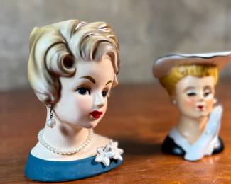 This lot features a pair of vintage lady head vases by Inarco & Nippon, circa 1950s. The largest measures, 5.5” H. 

