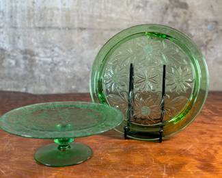 This lot features two pieces of antique uranium items including a cake plate and stand. Both glow under a black light and the platter measures, 10” H x 10” W.

