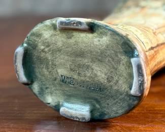 This lot features an antique Weller Pottery Forest vase. This design was created by Rudolph Lorber and produced between approximately 1915 and 1928. The vase measures, 8” H x 5.5” W x 3” D and comes in very good condition.

